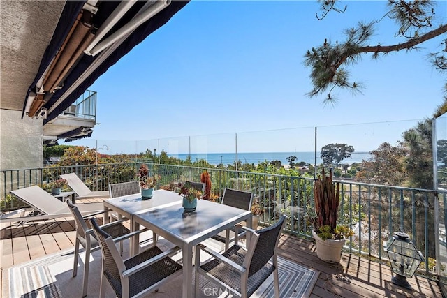 deck featuring outdoor dining area