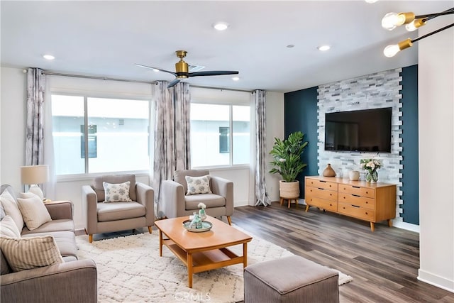 living room featuring baseboards, recessed lighting, dark wood-style flooring, and ceiling fan