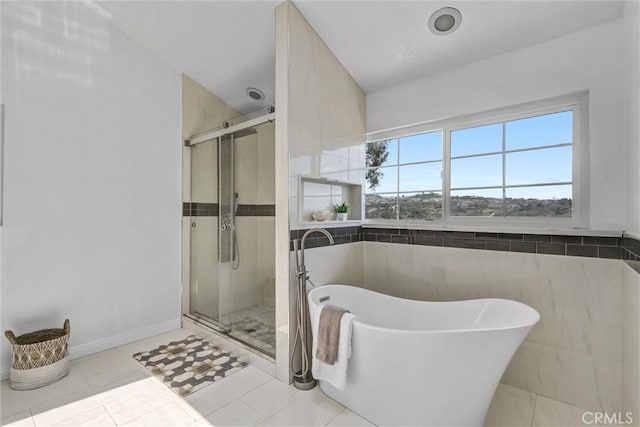 3118 Calle Grande, San Clemente, CA 92672 - full bath with a stall shower, a freestanding bath, and tile walls
