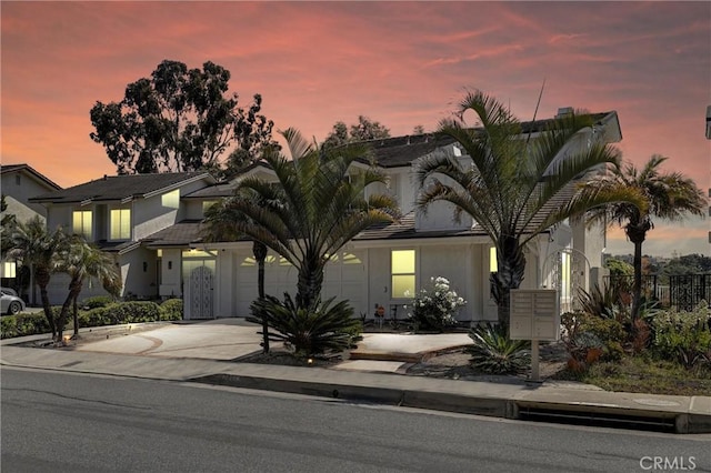 3118 Calle Grande, San Clemente, CA 92672 - view of front of property with concrete driveway, stucco siding, and an attached garage