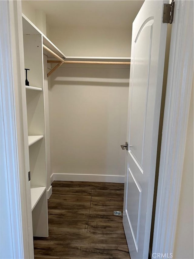 1741 Glenwood Rd, Glendale, CA 91201 - spacious closet featuring dark wood-type flooring