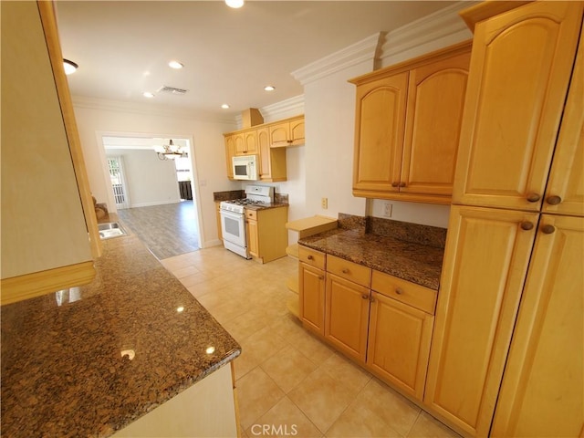 1741 Glenwood Rd, Glendale, CA 91201 - kitchen with white appliances, crown molding, dark stone counters, a chandelier, and light tile patterned floors