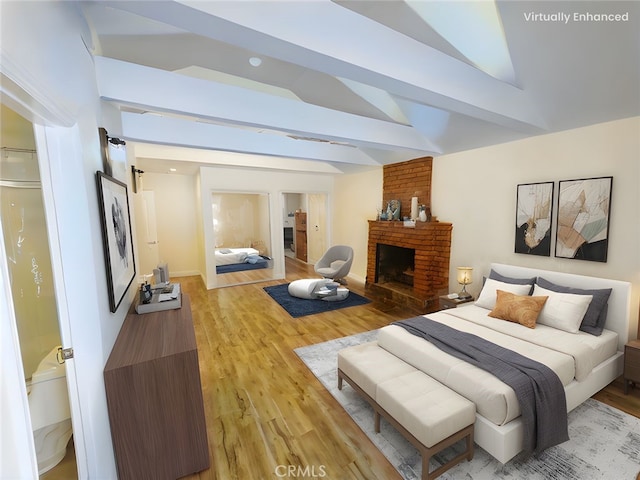 1741 Glenwood Rd, Glendale, CA 91201 - bedroom featuring light wood-style floors, vaulted ceiling, and a fireplace