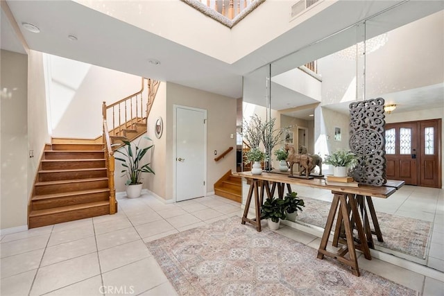 112 Morgan Ranch Rd, Glendora, CA 91741 - tiled foyer with baseboards, visible vents, stairs, and a towering ceiling