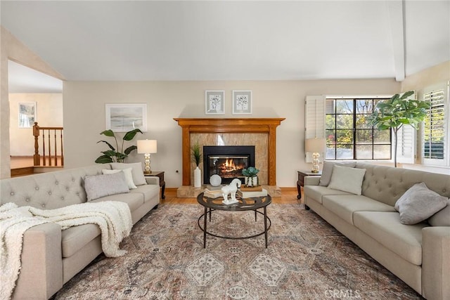 112 Morgan Ranch Rd, Glendora, CA 91741 - living room featuring a tiled fireplace, vaulted ceiling with beams, and wood finished floors