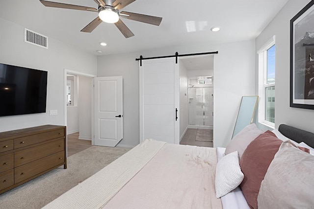 10456 Newbliss Way, Mira Mesa, CA 92126 - bedroom with a barn door, recessed lighting, ensuite bath, and ceiling fan