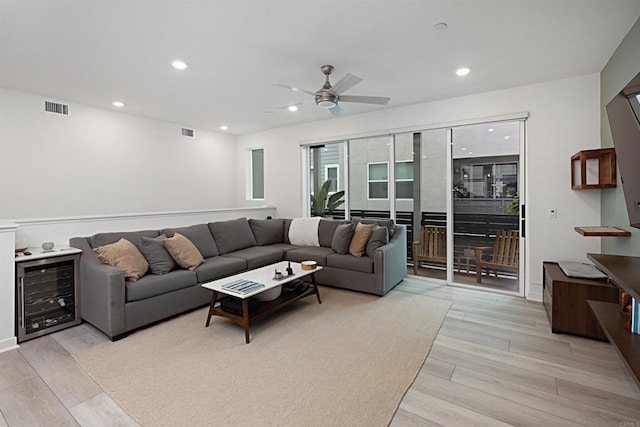 10456 Newbliss Way, Mira Mesa, CA 92126 - living room with wine cooler, a ceiling fan, light wood-style floors, and recessed lighting