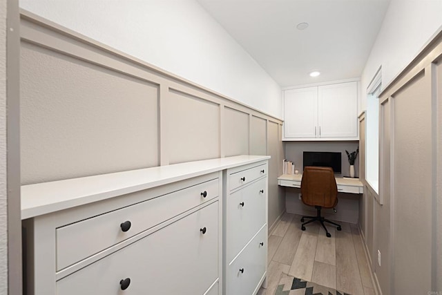 10456 Newbliss Way, Mira Mesa, CA 92126 - office space with built in desk, light wood-style floors, a decorative wall, and recessed lighting