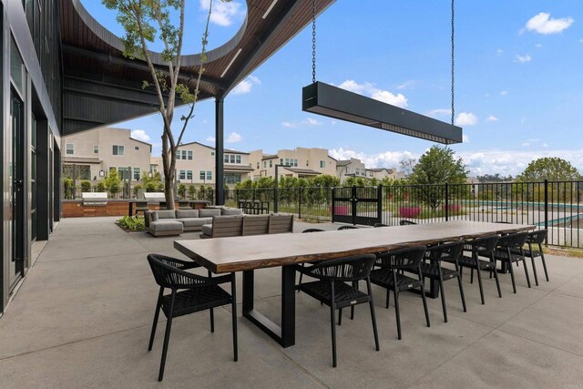 10456 Newbliss Way, Mira Mesa, CA 92126 - view of patio featuring fence, outdoor dining area, and a residential view