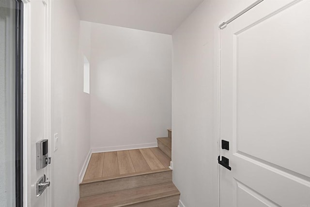 10456 Newbliss Way, Mira Mesa, CA 92126 - staircase with wood finished floors and baseboards