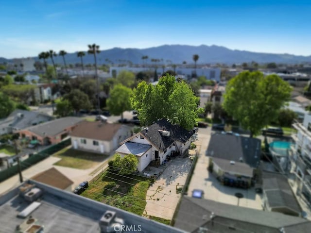 birds eye view of property featuring a residential view and a mountain view