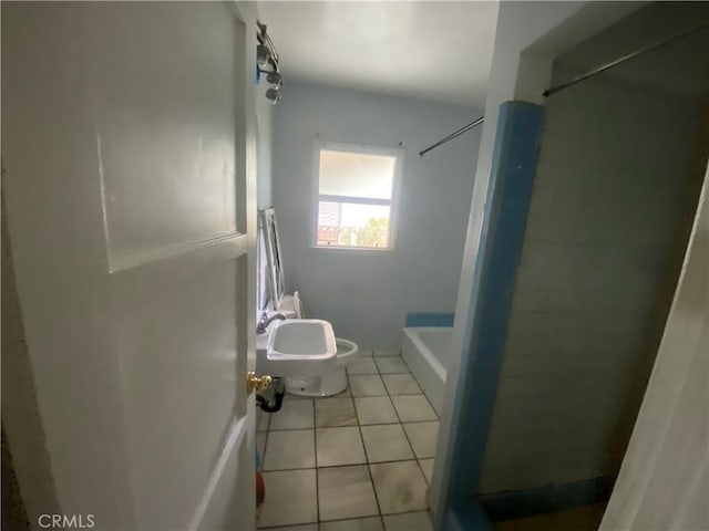 full bathroom featuring walk in shower, tile patterned floors, and toilet