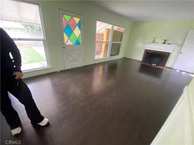 unfurnished living room with a fireplace