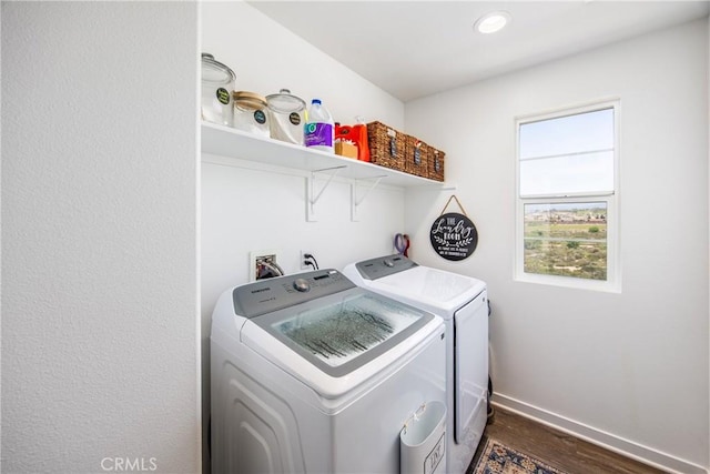 washroom featuring laundry area, washer and dryer, baseboards, dark wood-style floors, and recessed lighting