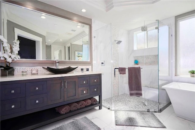 full bathroom with vanity, a soaking tub, marble finish floor, and a stall shower