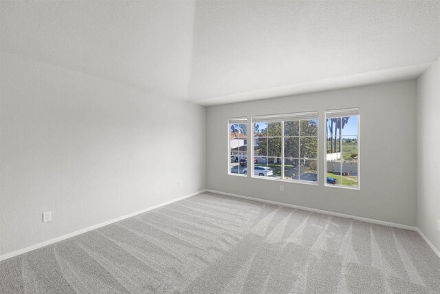 1366 Via Cibola, Oceanside, CA 92057 - carpeted spare room featuring baseboards and lofted ceiling