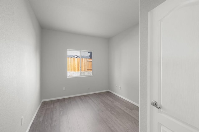 1366 Via Cibola, Oceanside, CA 92057 - spare room with baseboards and wood finished floors