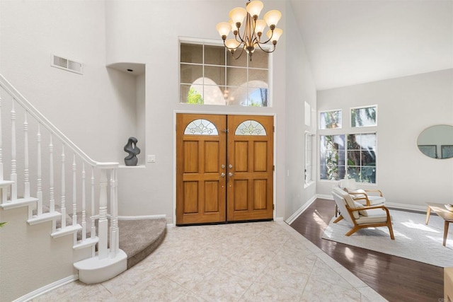 1366 Via Cibola, Oceanside, CA 92057 - entrance foyer featuring a high ceiling, a chandelier, stairs, baseboards, and visible vents
