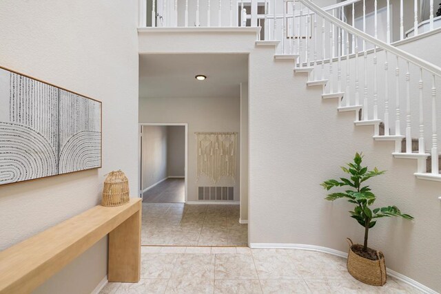 1366 Via Cibola, Oceanside, CA 92057 - stairway with visible vents, baseboards, and tile patterned floors