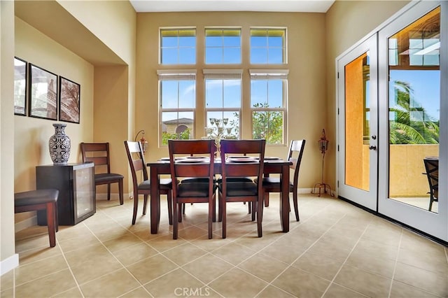 232 Village Commons Blvd Unit 21, Camarillo, CA 93012 - dining space with light tile patterned floors and french doors