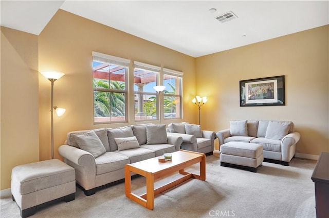 232 Village Commons Blvd Unit 21, Camarillo, CA 93012 - living room featuring light carpet and baseboards