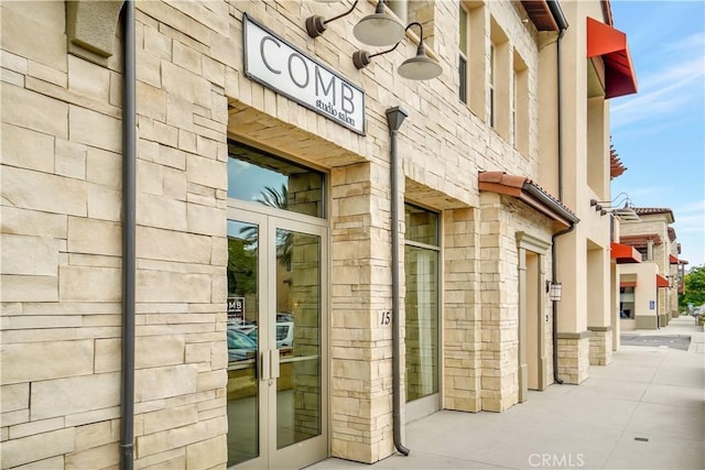 232 Village Commons Blvd Unit 21, Camarillo, CA 93012 - property entrance featuring french doors and stone siding