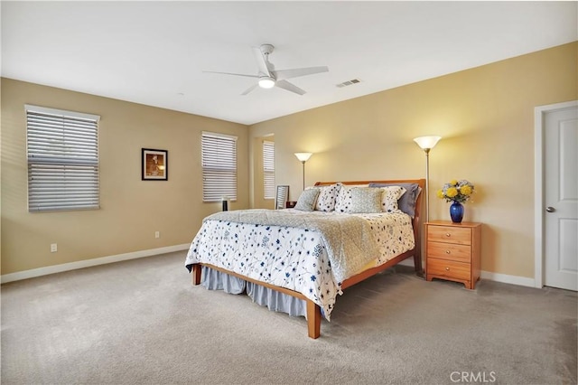 232 Village Commons Blvd Unit 21, Camarillo, CA 93012 - bedroom featuring carpet floors, multiple windows, and ceiling fan