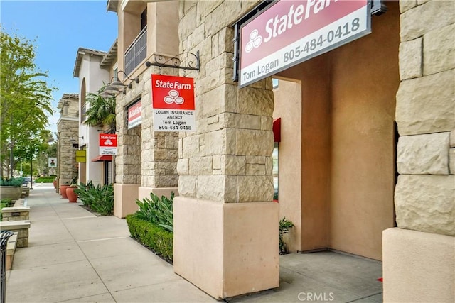 232 Village Commons Blvd Unit 21, Camarillo, CA 93012 - entrance to property featuring stone siding