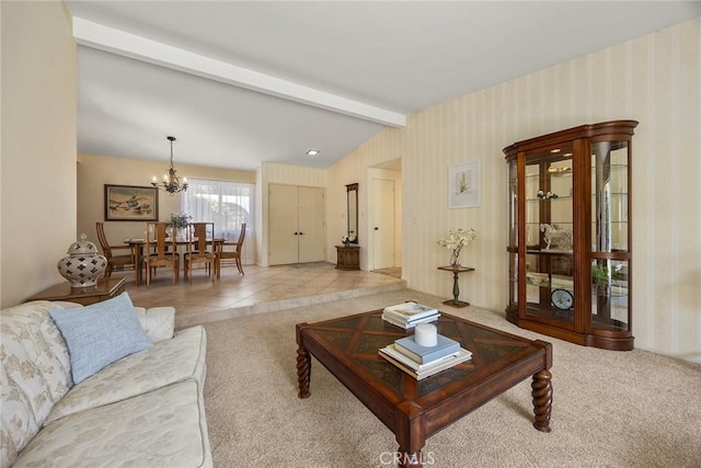 carpeted living area featuring lofted ceiling with beams, tile patterned floors, and a chandelier