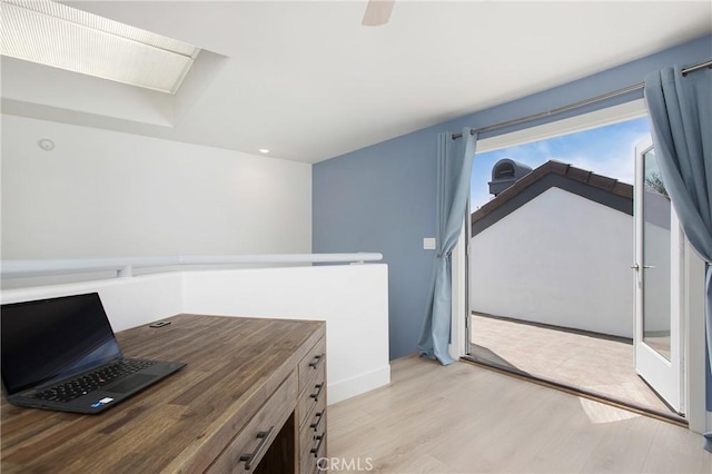 unfurnished office with light wood-style floors and recessed lighting