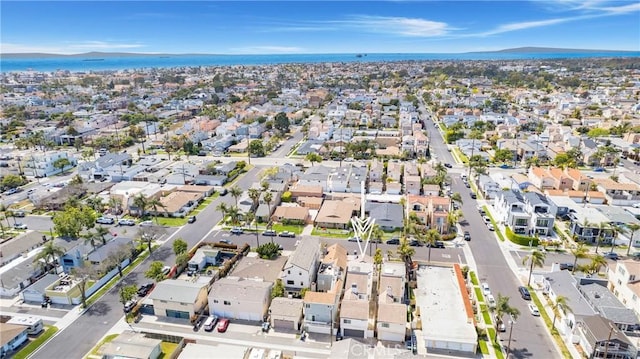aerial view featuring a residential view and a water view