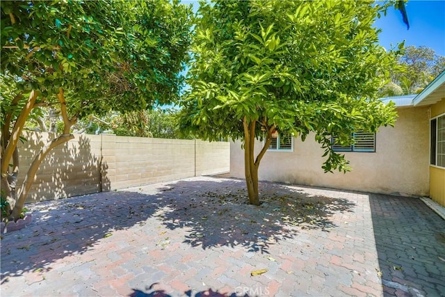 view of patio with a fenced backyard