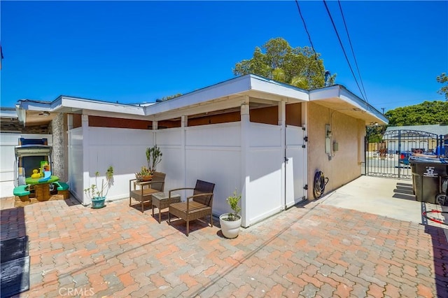 exterior space with a gate and fence