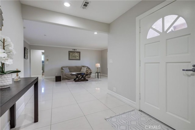entryway featuring visible vents, recessed lighting, baseboards, and light tile patterned floors