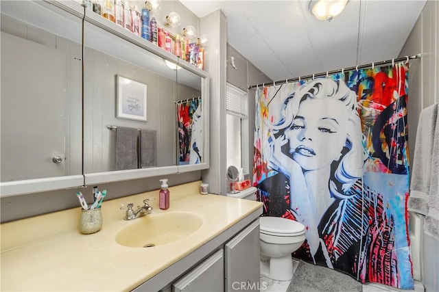 full bathroom with vanity, toilet, and a shower with shower curtain