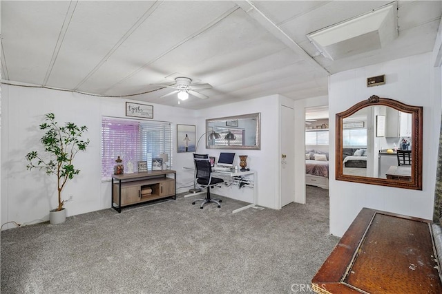 home office with carpet floors and ceiling fan