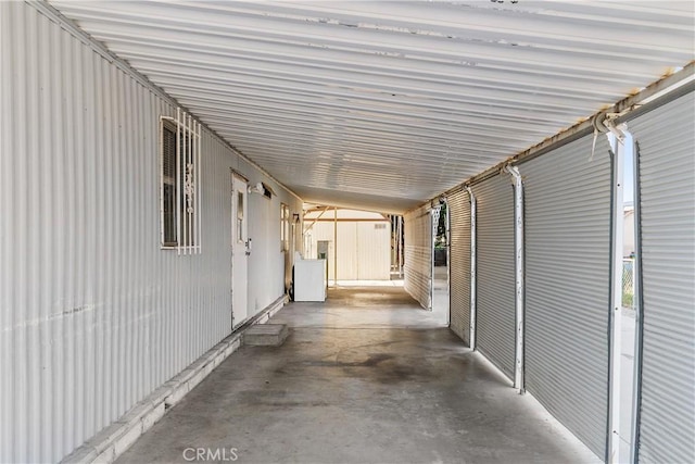 view of patio / terrace featuring an attached carport