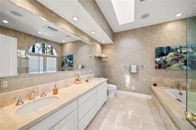 bathroom featuring visible vents, a sink, a bath, and double vanity