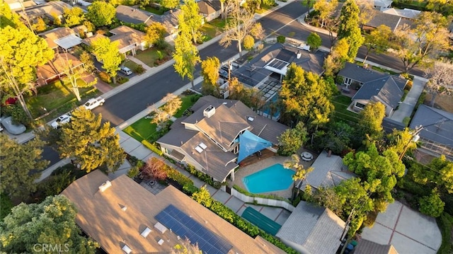 birds eye view of property with a residential view