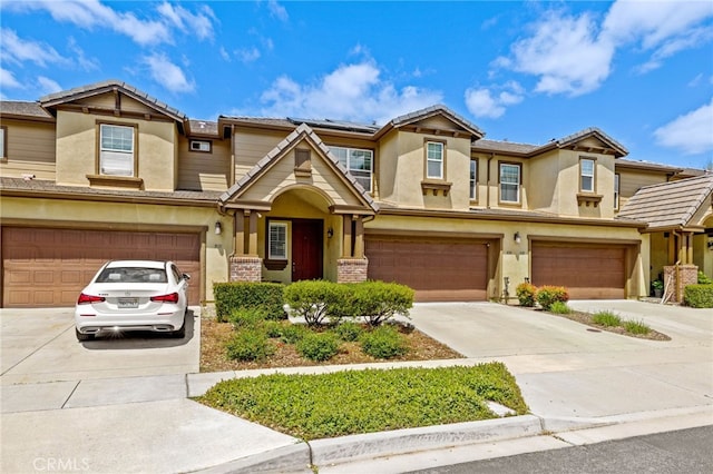 9133 Arbol Del Rosal Way Unit 230, Atascadero, CA 93422 - multi unit property with a garage, concrete driveway, and stucco siding
