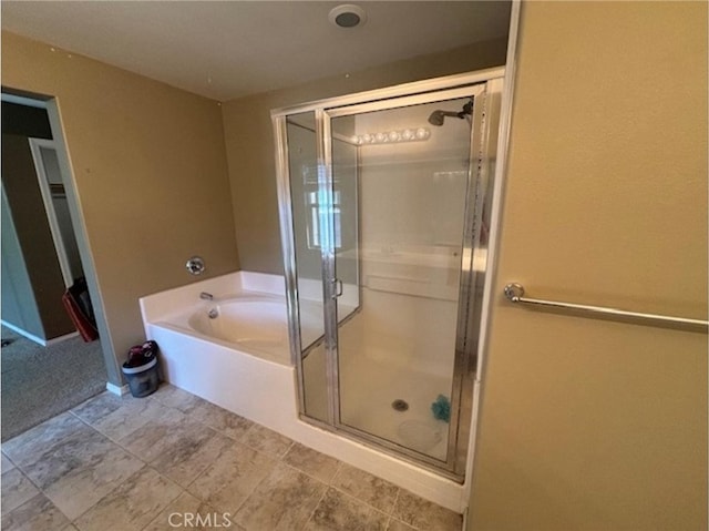 9133 Arbol Del Rosal Way Unit 230, Atascadero, CA 93422 - bathroom featuring a stall shower, a garden tub, and tile patterned flooring