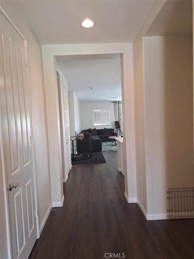 1361 Crown Imperial Ln, Beaumont, CA 92223 - corridor with recessed lighting, baseboards, and dark wood-style floors