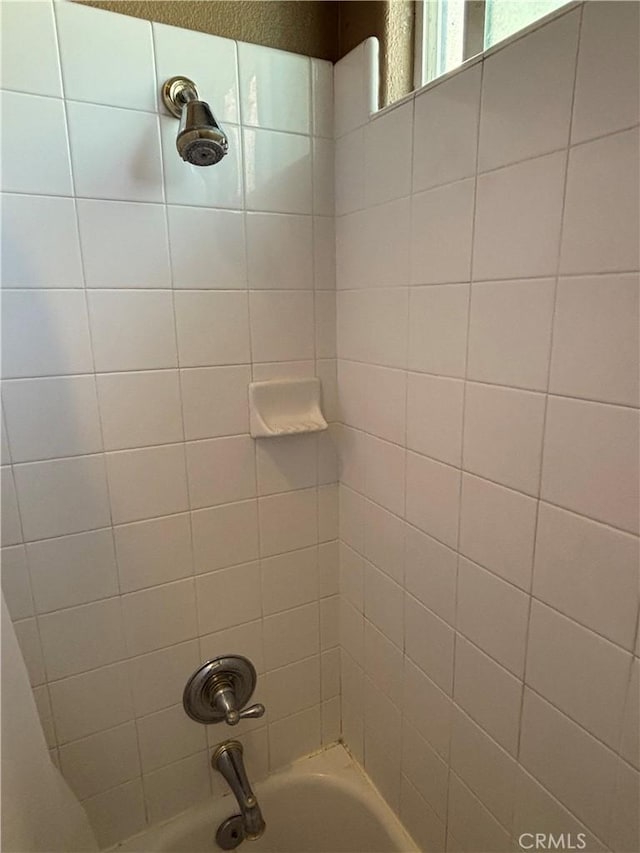 full bath with bathing tub / shower combination