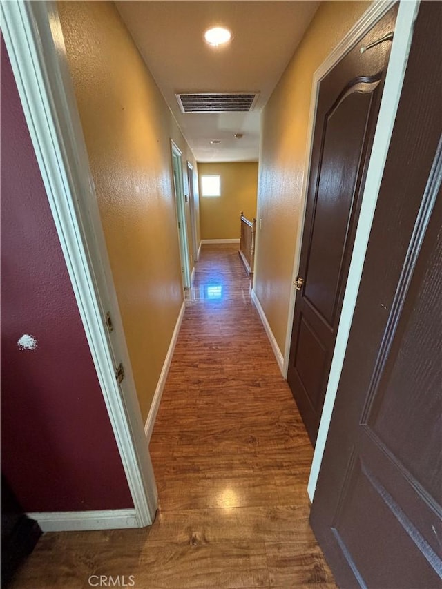 343 San Bernardino St, Los Banos, CA 93635 - corridor with wood finished floors and baseboards