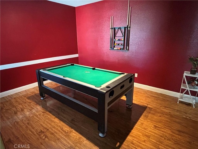 rec room with baseboards, wood finished floors, and pool table