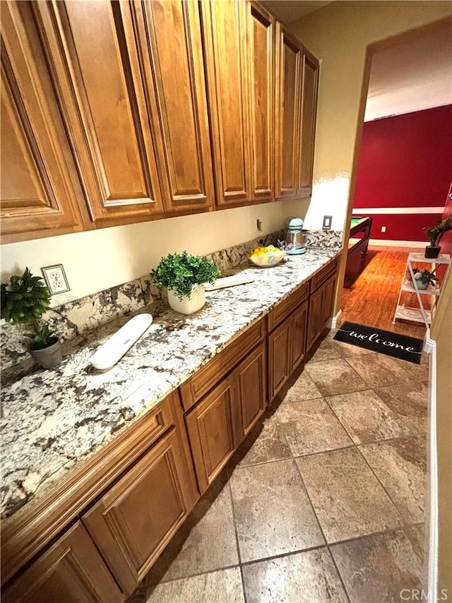 interior space featuring stone tile floors