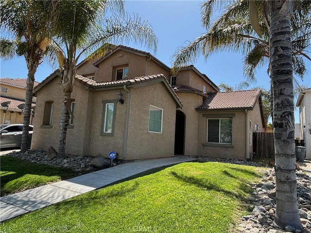 343 San Bernardino St, Los Banos, CA 93635 - mediterranean / spanish-style house with stucco siding and a tile roof