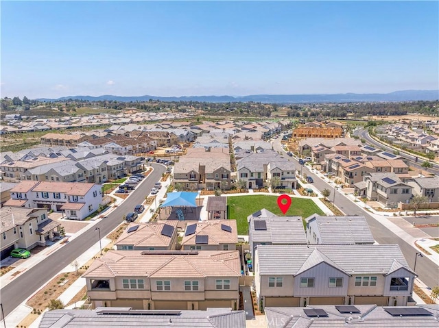 bird's eye view with a mountain view and a residential view