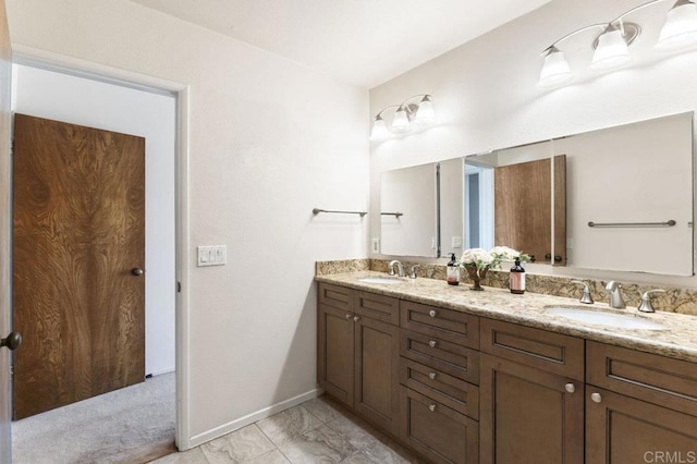 68256827 Kellyn Ln, Vista, CA 92084 - full bathroom with a sink, baseboards, double vanity, and marble finish floor