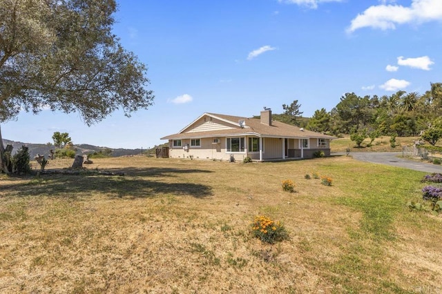 68256827 Kellyn Ln, Vista, CA 92084 - exterior space with a lawn, a chimney, and aphalt driveway